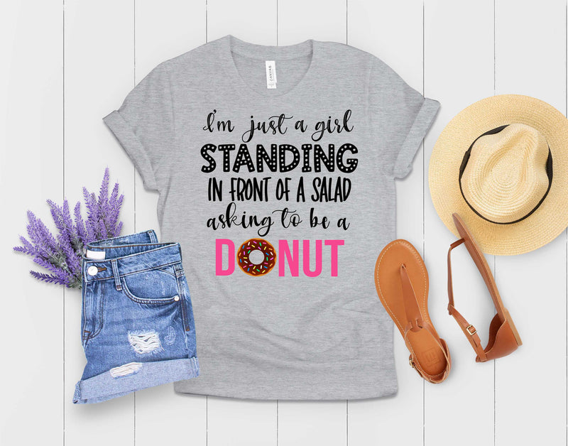 Just a girl standing in front of a salad asking it to be a donut